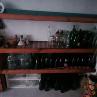 Bottiglie vetro e vasetti con tappi