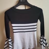 blusa da donna bianca e nera