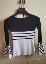 blusa da donna bianca e nera