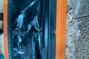 tendina copri bagagli