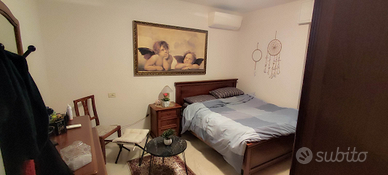 Camera matrimoniale per una donna/ragazza