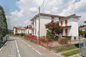 Ampio bilocale a Como con posto auto e balcone