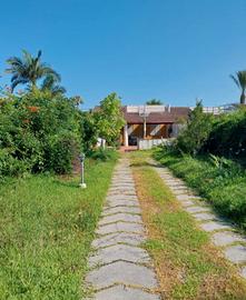 Terreno con villa annessa