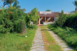 Terreno con villa annessa