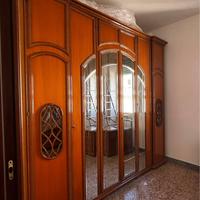 Camera da letto classica in legno massello