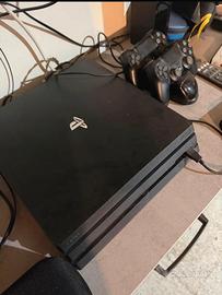 Console PS4 + 2 controller sony + base rica+ gioco