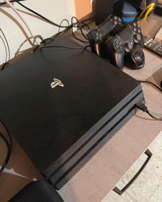 Console PS4 + 2 controller sony + base rica+ gioco