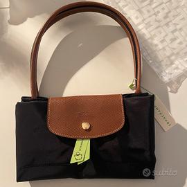 Borsa Longchamp nera con manico in pelle marrone