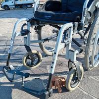 Carrozzina pieghevole manuale, sedia a rotelle