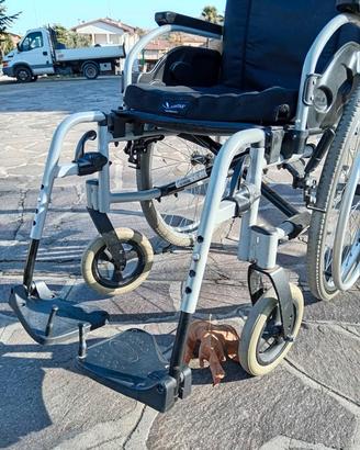 Carrozzina pieghevole manuale, sedia a rotelle