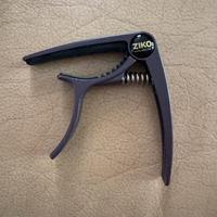 Capotasto per chitarra acistica