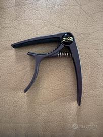 Capotasto per chitarra acistica