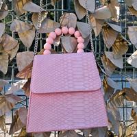 Borsa rosa effetto pitonato manico a perle Pimkie