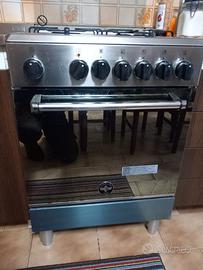 PIANO COTTURA CON 4 FORNELLI