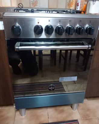 PIANO COTTURA CON 4 FORNELLI