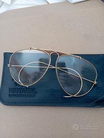 montatura dorata Rayban 
