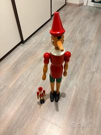 Coppia di Pinocchio in legno