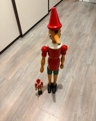 Coppia di Pinocchio in legno