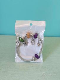 Bracciale colorato con  charms stella marina...