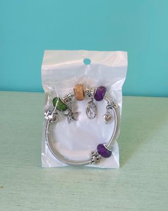 Bracciale colorato con  charms stella marina...