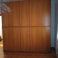 Mobili in legno noce per camera da letto