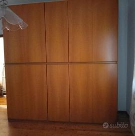 Mobili in legno noce per camera da letto