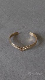 Braccialetto rigido dorato con strass 