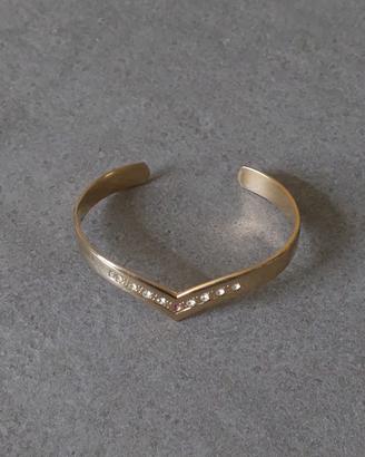 Braccialetto rigido dorato con strass 