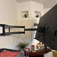 Tv e braccio per parete