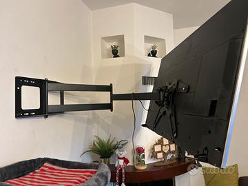 Tv e braccio per parete