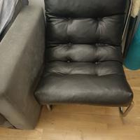 coppia di poltroncine nere in pelle