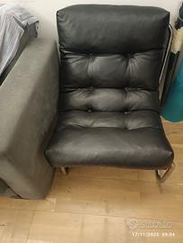 coppia di poltroncine nere in pelle