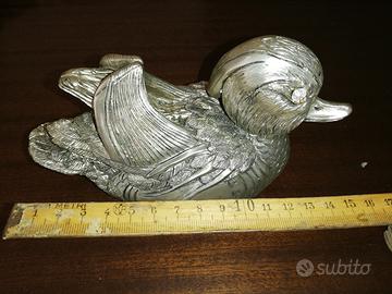 Scultura rifinita in lamina d'argento