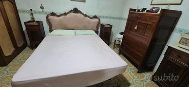 Camera da letto con comò e 2 comodini