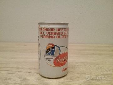 Bottiglie e lattina coca-cola
