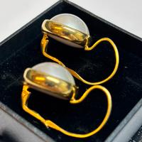 Orecchini in oro giallo e perle