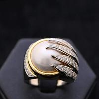 Anello scrape in oro brillanti 0,60ct e perla