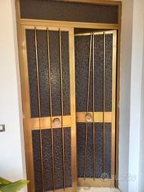 portone di ingresso in vetro e alluminio