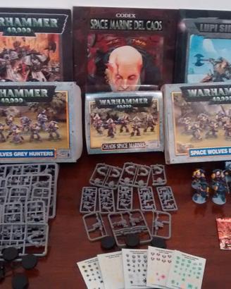 Miniature Warhammer 40.000 con manuali e colori