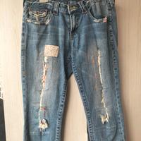 jeans strappato e toppe