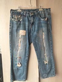 jeans strappato e toppe
