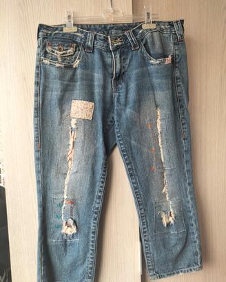 jeans strappato e toppe