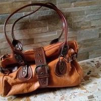 Borsa artigianale made in Italy in pelle mai usata