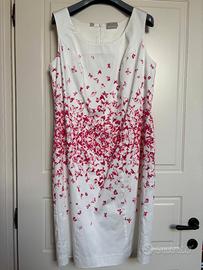 Vestito bianco con decorazione farfalle fucsia