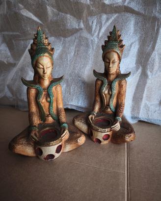 Coppia porta candele etnici con figure Orientali 
