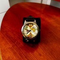 Orologio con mappa antica