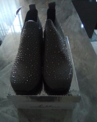 Sneakers con rialzo interno nuove