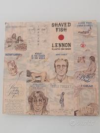 33 giri Lennon plastic Ono band tenuto in vetrina