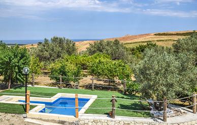 Casa nella natura vista mare