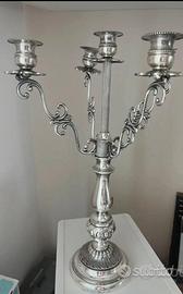 Cinque fiamme in bagno d’argento